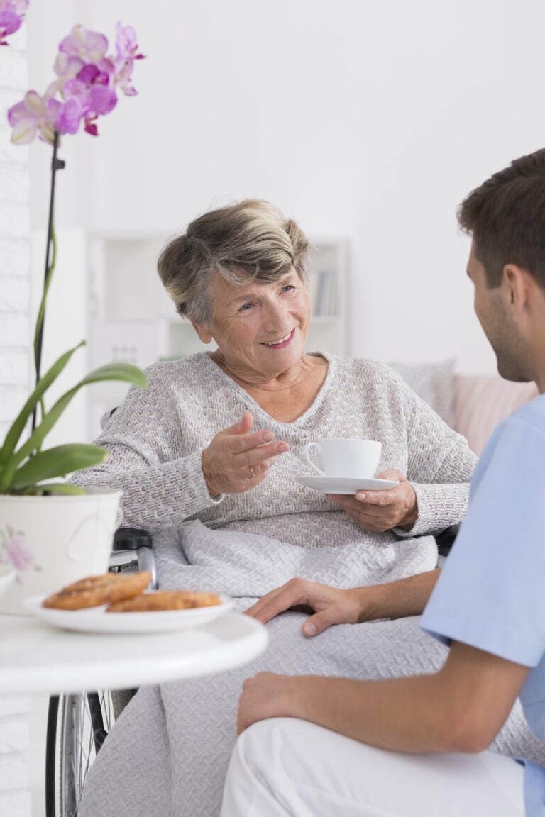 Grandmother talking with caregiver